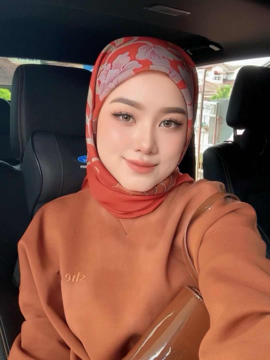 Founder Cik Sal curating LQ Perfumes fragrance palettes